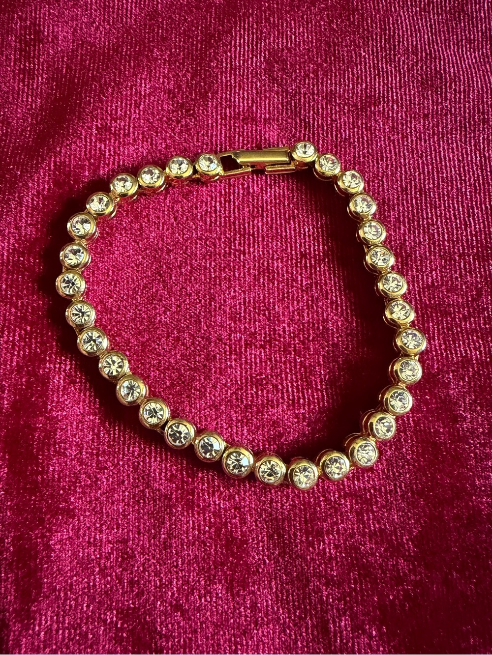 Avon Gold Tone Clear Rhinestone Tennis Bracelet